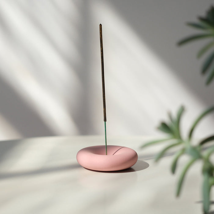 Pink Eve Incense sticks in a container, designed for home ambiance and relaxation, from the Misewell Eve Incense collection.