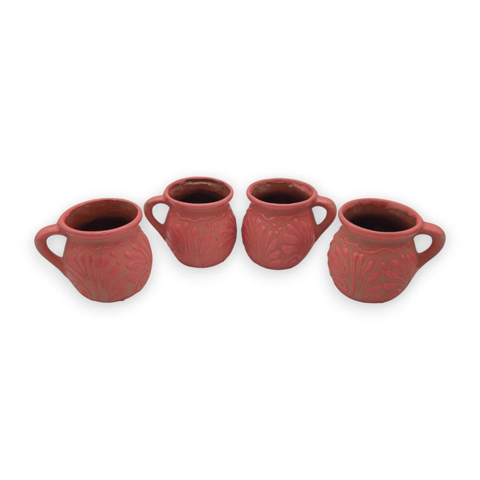 Pink Talavera mug with colorful traditional Mexican patterns, handcrafted by The Talavera Hub.